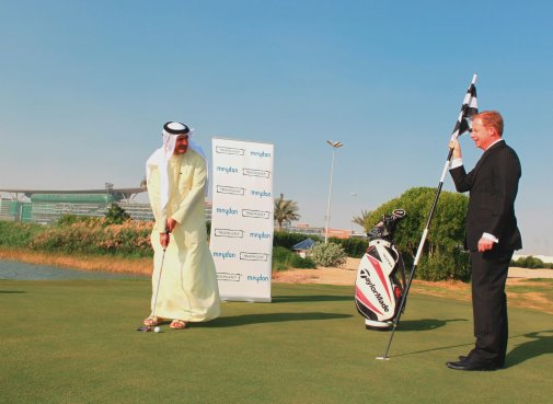 Meydan CEO Saeed Humaid Al Tayer putts with Troon’s Bruce Glasco