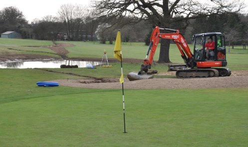 Speedcut building a new bunker by the side of a new pond at The Leatherhead Golf Club, Surrey