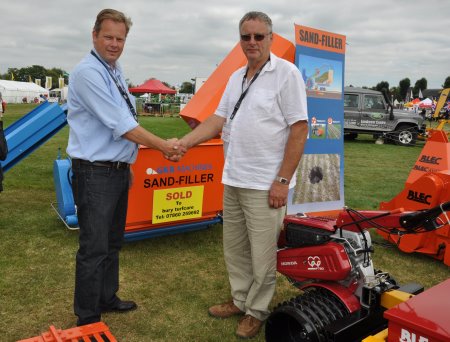 GKB Sandfiller sold at Saltex to Peter Knight, right, of Bury Turfcare, on the BLEC stand with GKB’s Jan-Willem Kraaijeveld DSC_0016