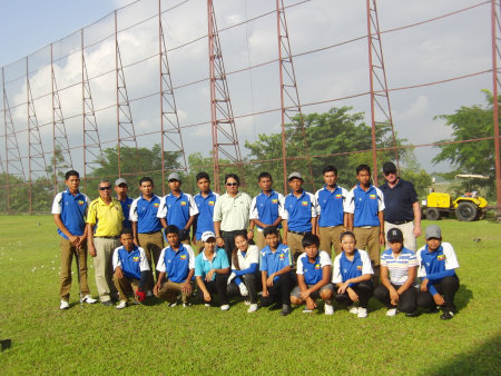 Mark Holland (far right) with some of the Myanmar players