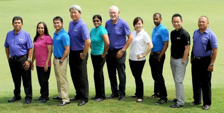 Staff and Officials of the Asian Tour posing in their latest Abacus apparel