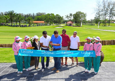 Ravi Chandran and Paul Jansen cut the ribbon to mark the official re-opening of the course