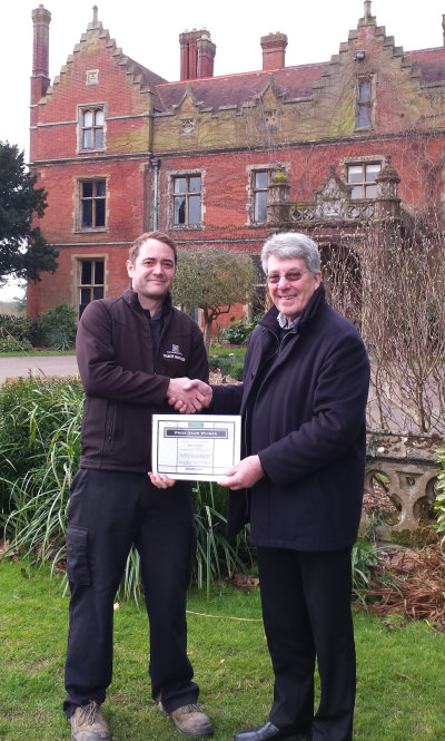 David Mears presents winning certificate to James Bonfield