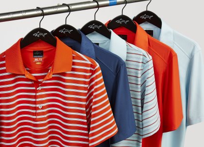 Greg Norman polo shirts on coat hangers
