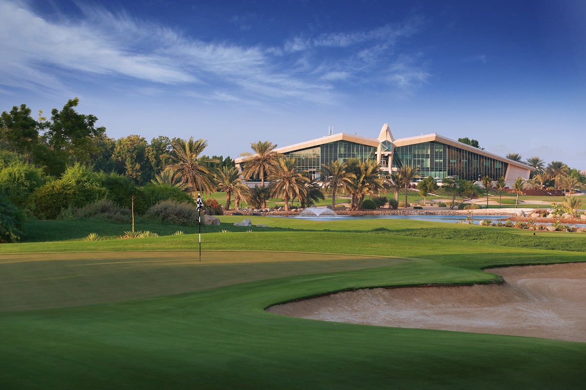 The 14th hole at Abu Dhabi Golf Club, with the Falcon Clubhouse in sight