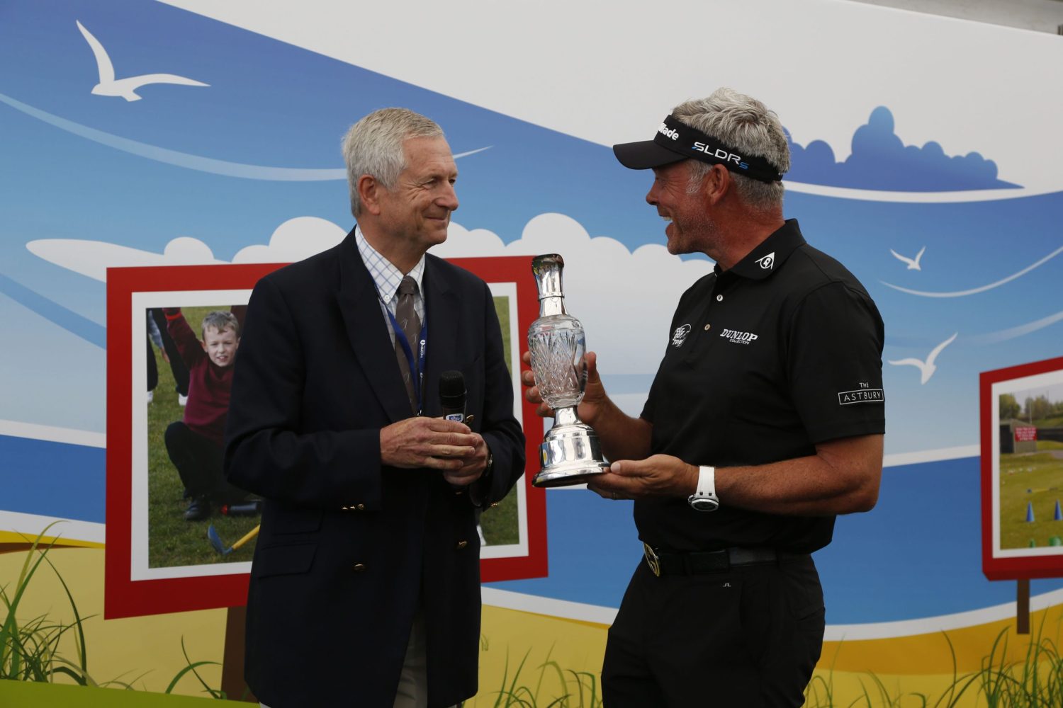 Darren Clarke receives Spirit of Golf Award from Charles