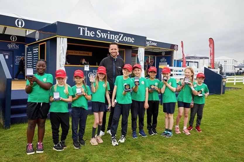 Nick Dougherty with GF school pupils at The Open 2021
